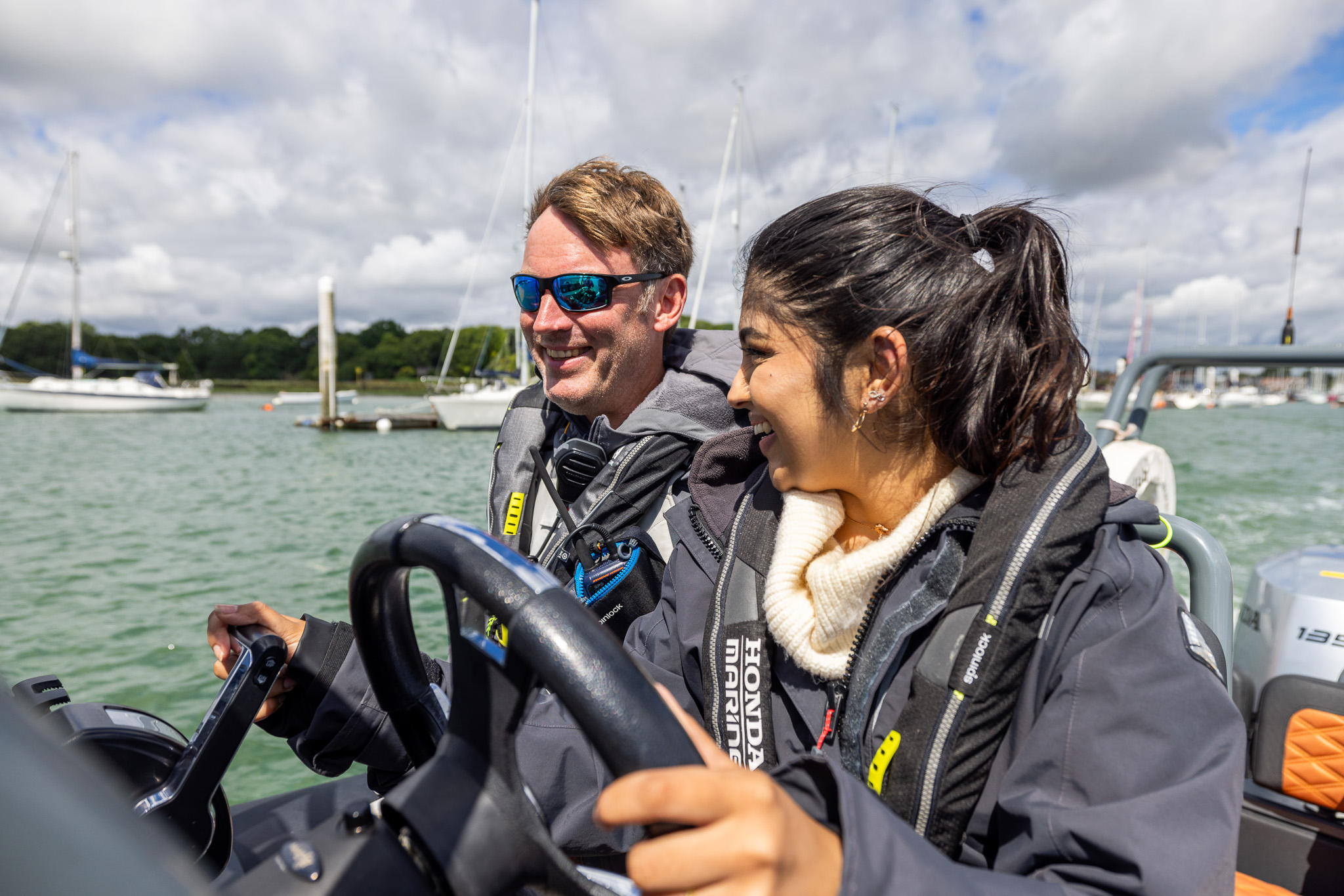 Members at the helm on The Solent