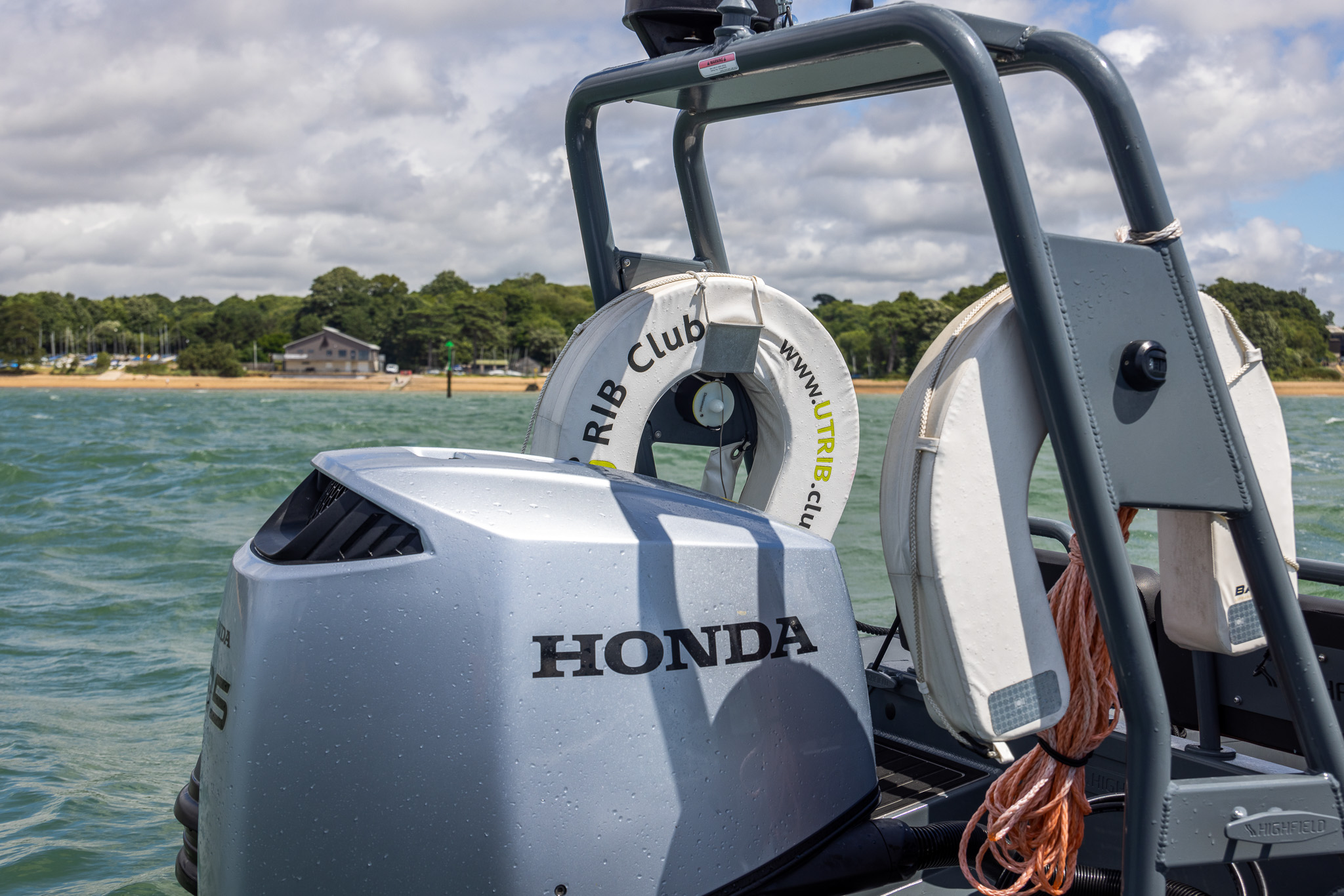 Honda outboard engine and safety lifering on a RIB