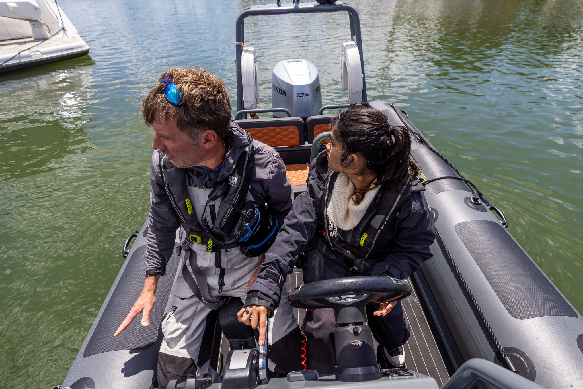 Instructor and student at the helm during training